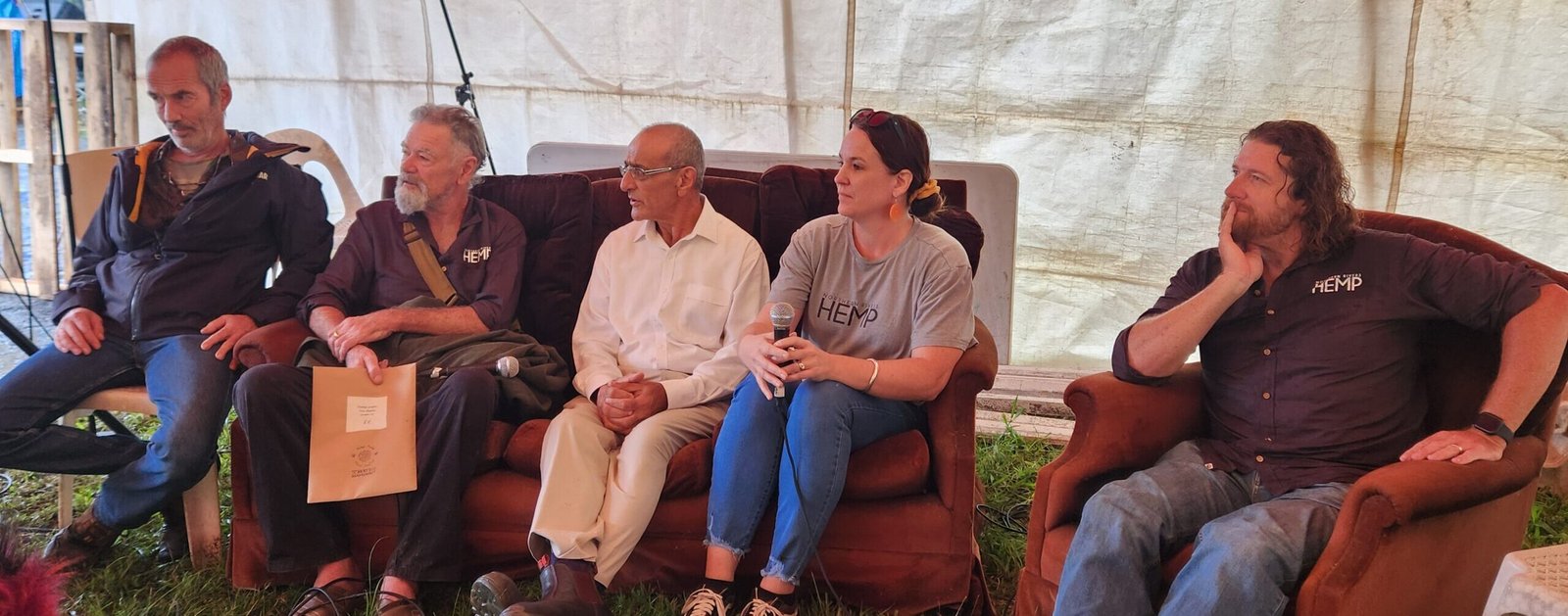 5 people seated in a panel