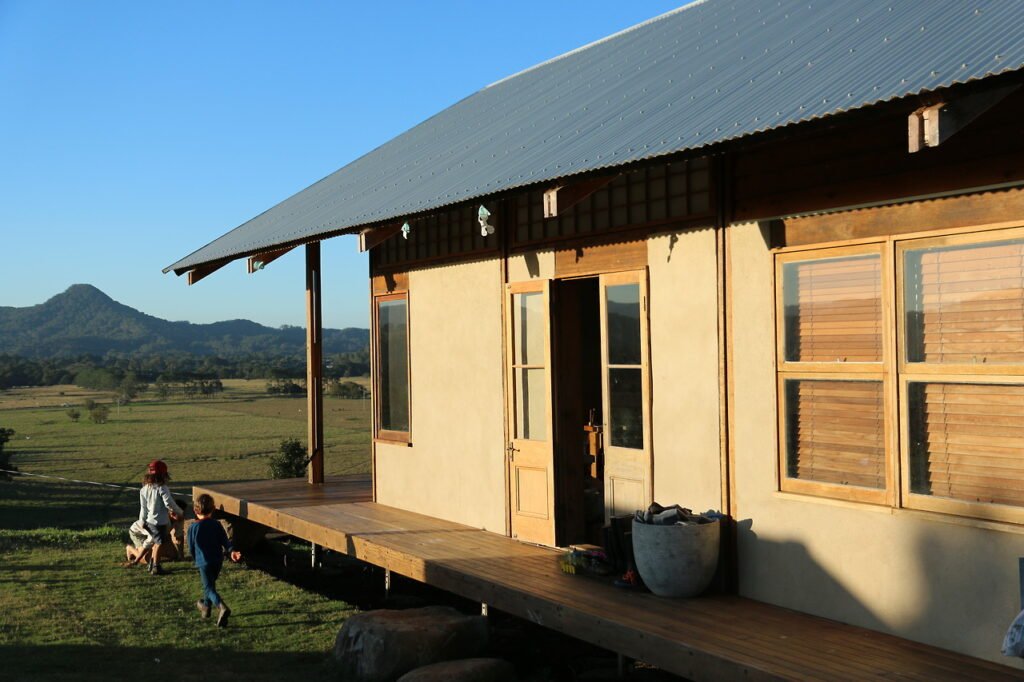 Sunlight hitting the outside wall of a hempcrete building 